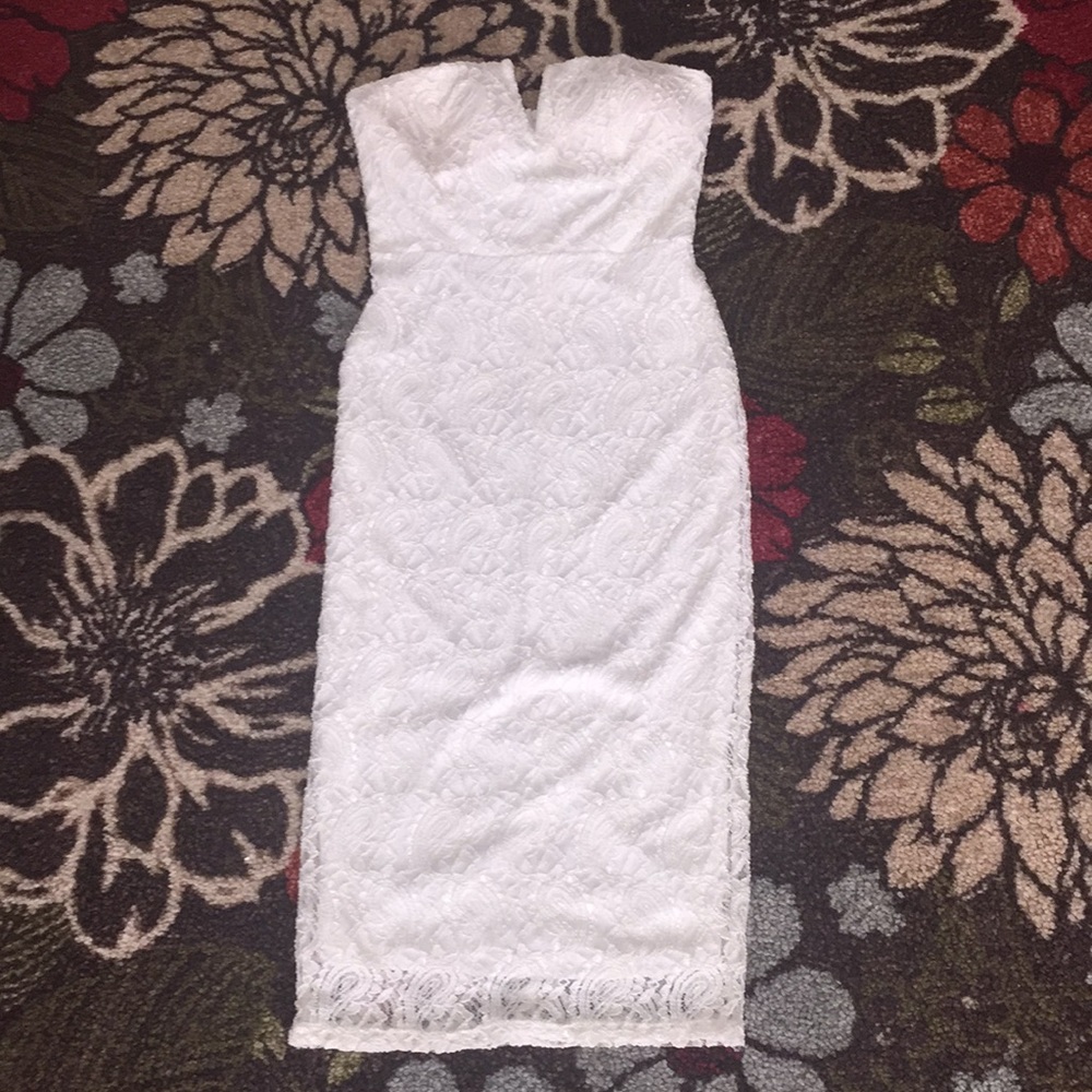Lace Form Fitting strapless dress.